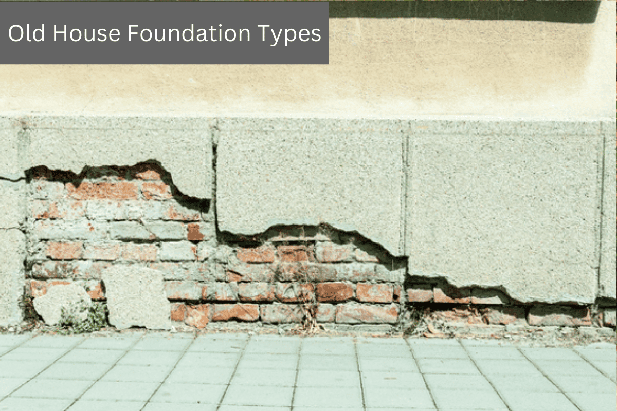 Damaged house foundation with exposed bricks and cracked concrete