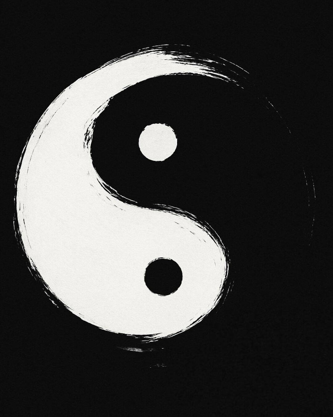 A minimalist yin-yang symbol painted with bold black brushstrokes on a white background, using only negative space to form the shape. The dynamic, imperfect lines reflect the spirit of balance through disruption—an abstract visual metaphor for the Start Zen Revolution.