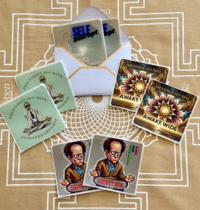 An array of the Greatfruit Zen Mind stickers for sale in the online shop. Images include playful meditating figures and a mandala. Stickers read: serenity now, fuhgeddaboudit, awake wide and self disrupt.