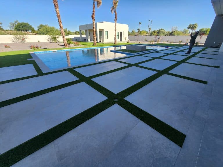 Vast outdoor space with clean lines and pool, perfect for outdoor design projects.