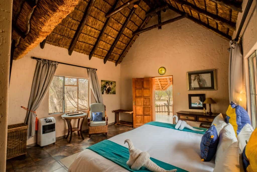 Grassland Safari Lodge Kalahari Botswana bedroom chalet double bed view