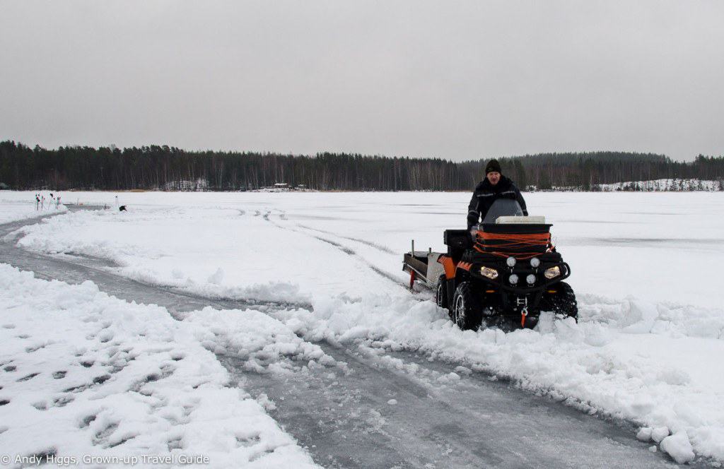 Snowmobile on frozen lake