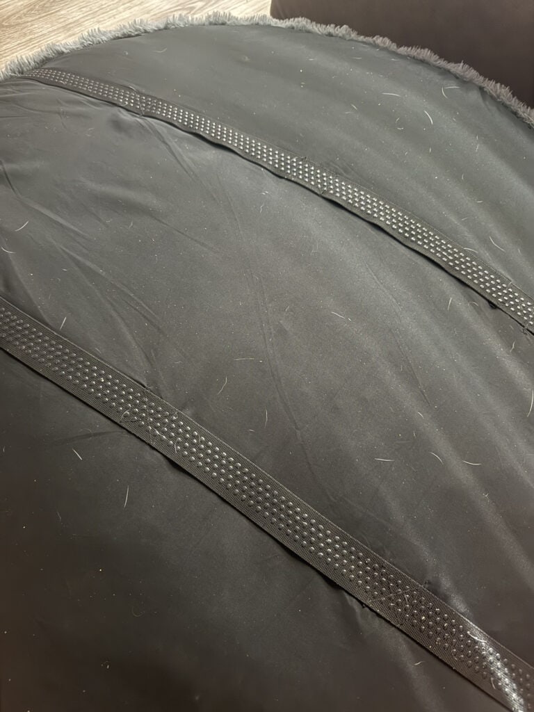 a back of dog bed with handles