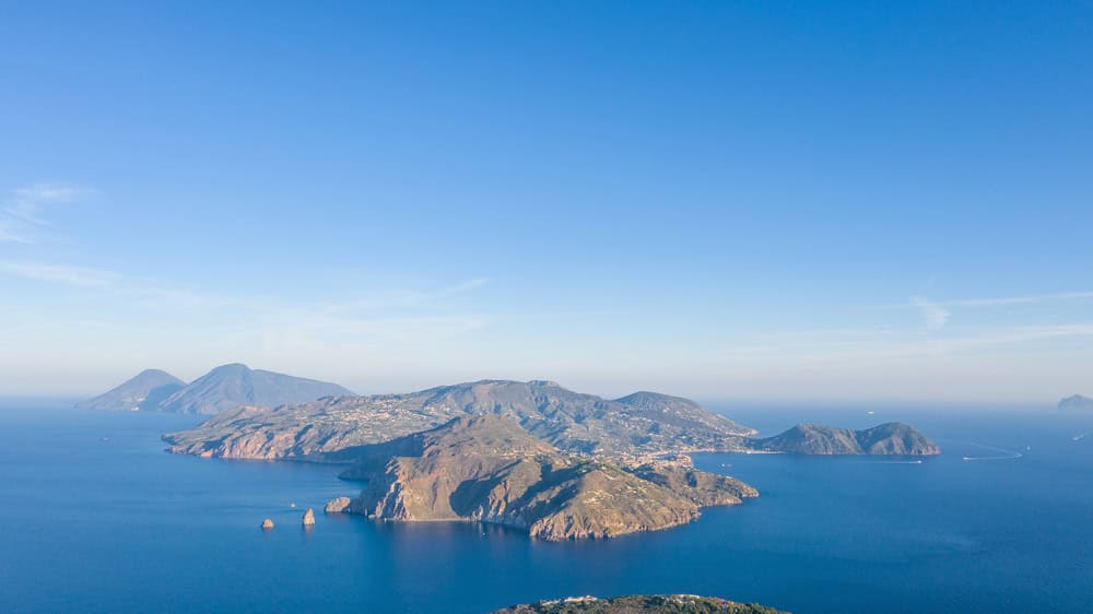 Aerial view of the Aeolian Islands, Italy – a stunning volcanic archipelago in the Mediterranean with rugged landscapes and deep blue waters.
