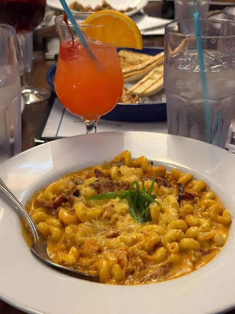 Elevated macaroni and cheese with a tropical cocktail at Cobalt, The Restaurant in Orange Beach, Alabama.
Select 77 more words to run Humanizer.