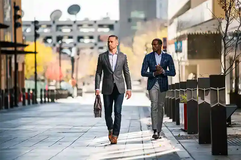 Boise ID business professionals walking outdoors.