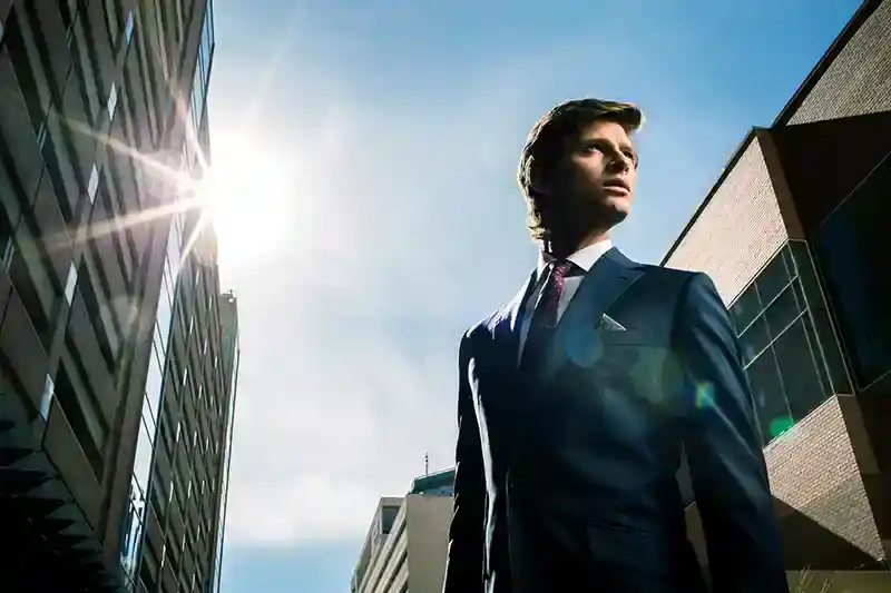 Business professional in cityscape during daytime.