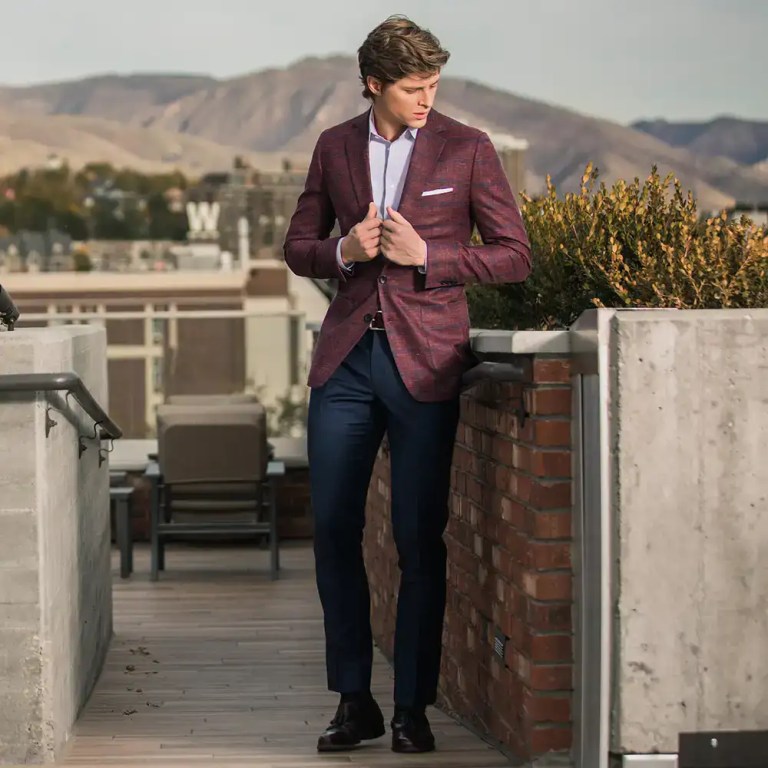 Men's burgundy blazer for stylish outdoor events and professional settings.