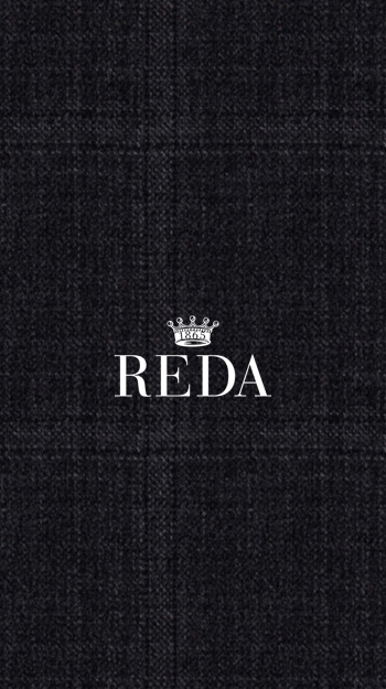 Close-up of black textured fabric from Reda, showcasing quality and weave detail.