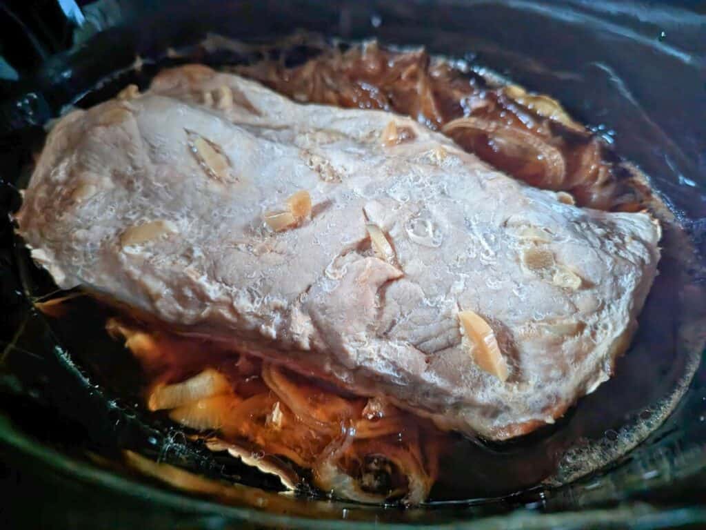 Garlic Roast Pork cookedi n a crock pot.