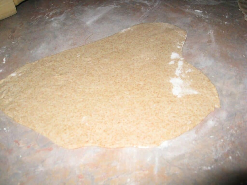 Image shows dough flattened.
