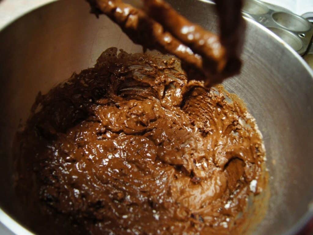 Image shows chocolate cinnamon cupcakes batter.