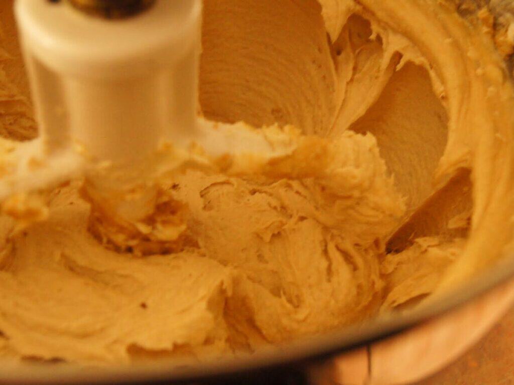 Image shows butter, sugars, and cream cheese creamed together.