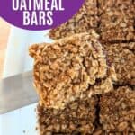 Image shows a Spatula holding a jam bar with text fast and easy raspberry oatmeal bars.