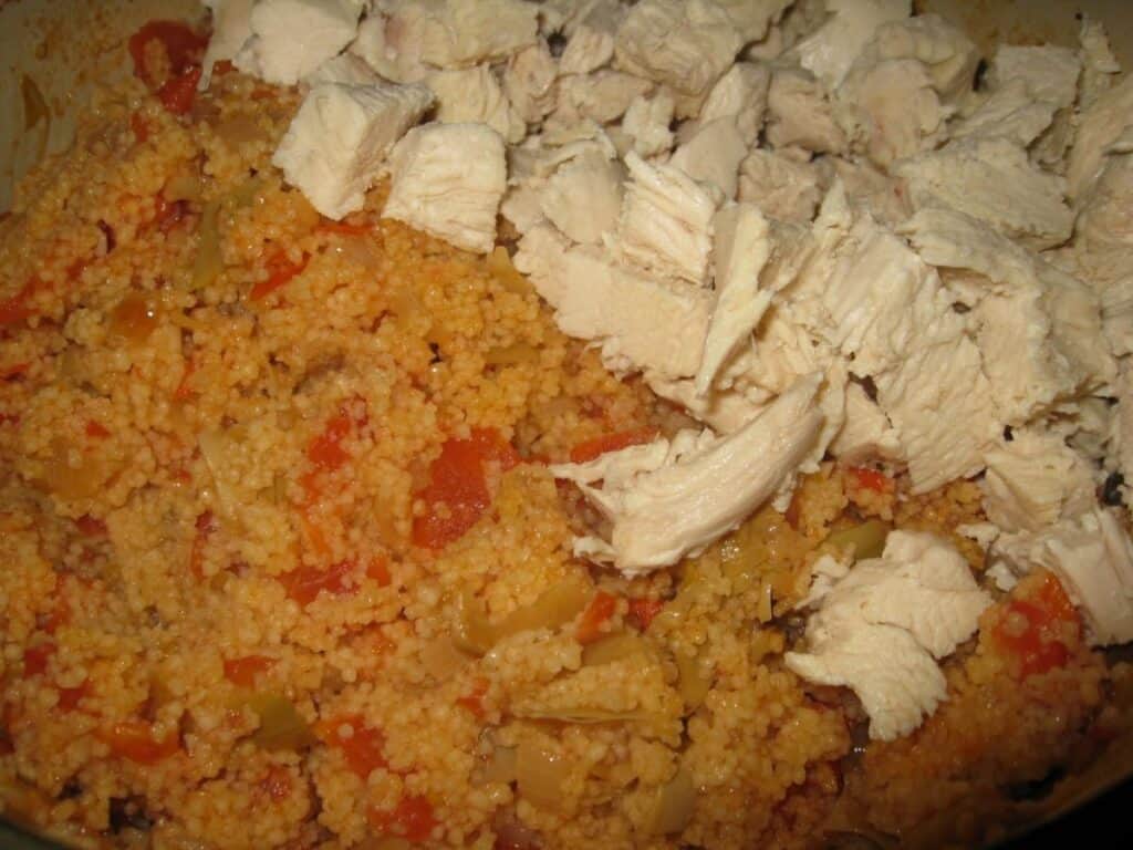 Image shows chicken and couscous added.