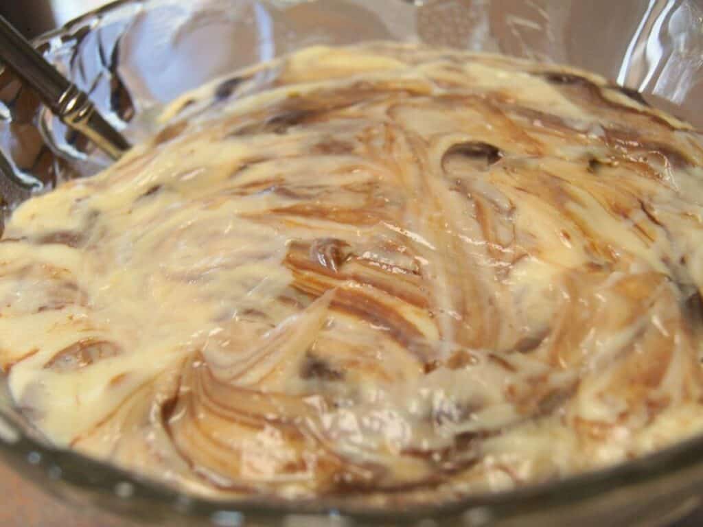 Image shows homemade vanilla pudding.
