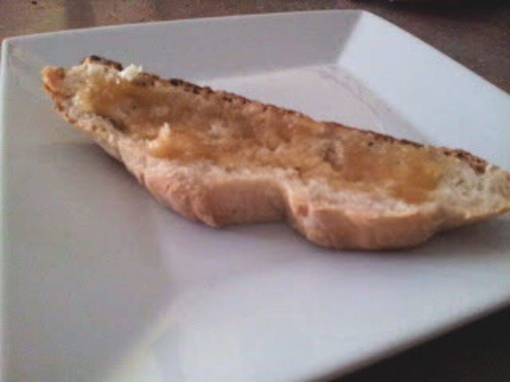 Image shows bread on a plate.