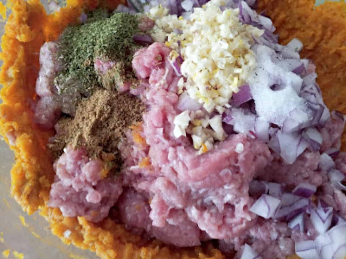 Ingredients for sweet potato meatballs in a bowl.