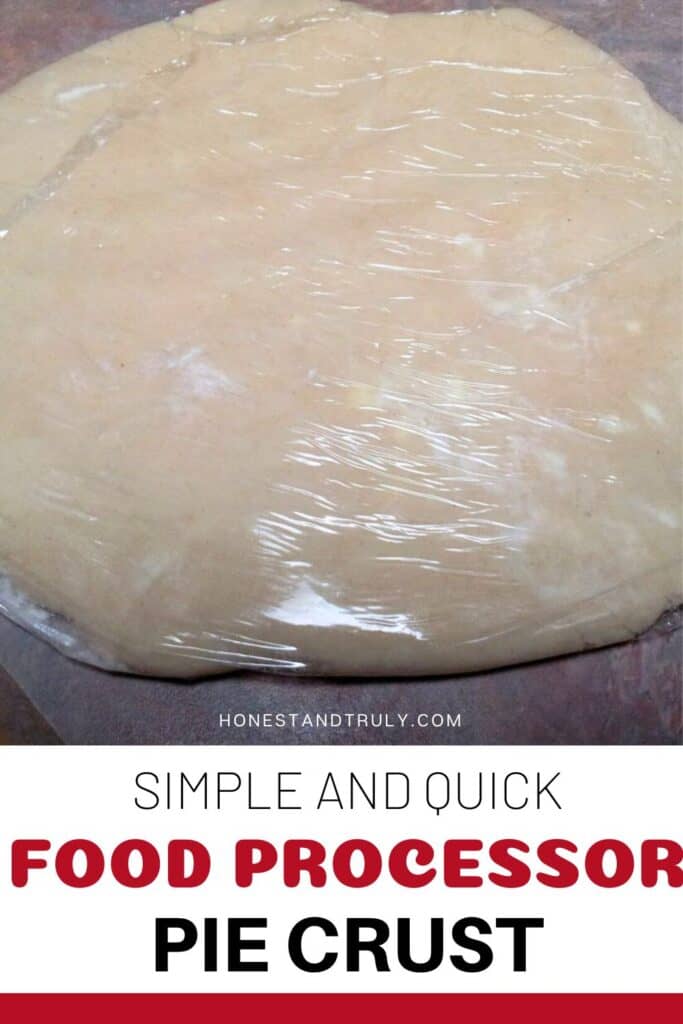 Image shows close-up picture of pie dough covered with plastic wrap.