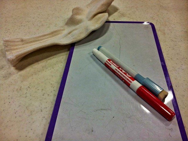Whiteboard with sock eraser