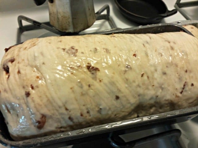 Brush your risen cinnamon raisin dough with an egg wash just before baking