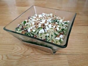 Spinach orzo pasta salad in a bowl as pretty as it deserves