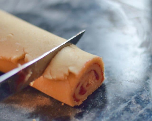Use a serrated knife to slice cookies
