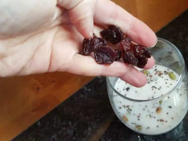 Add dried cherries to cereal and milk