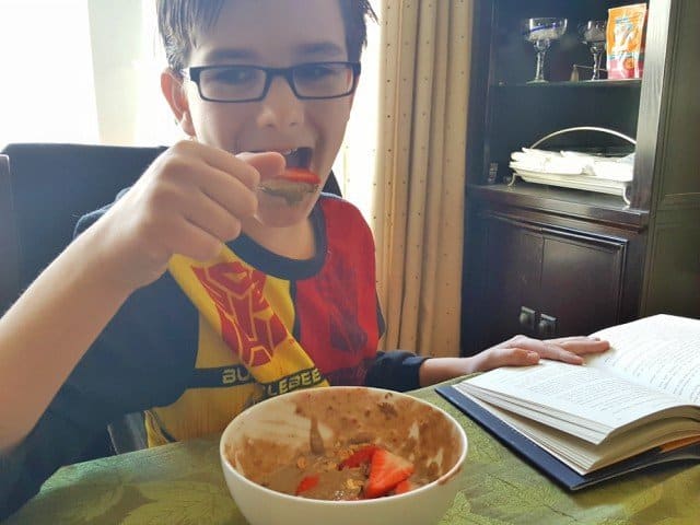 Gobbling up his protein power smoothie bowl