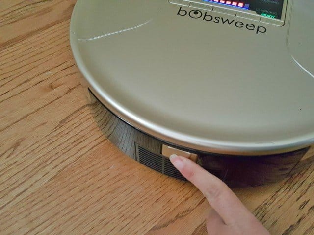 Press this button to open his dustbin