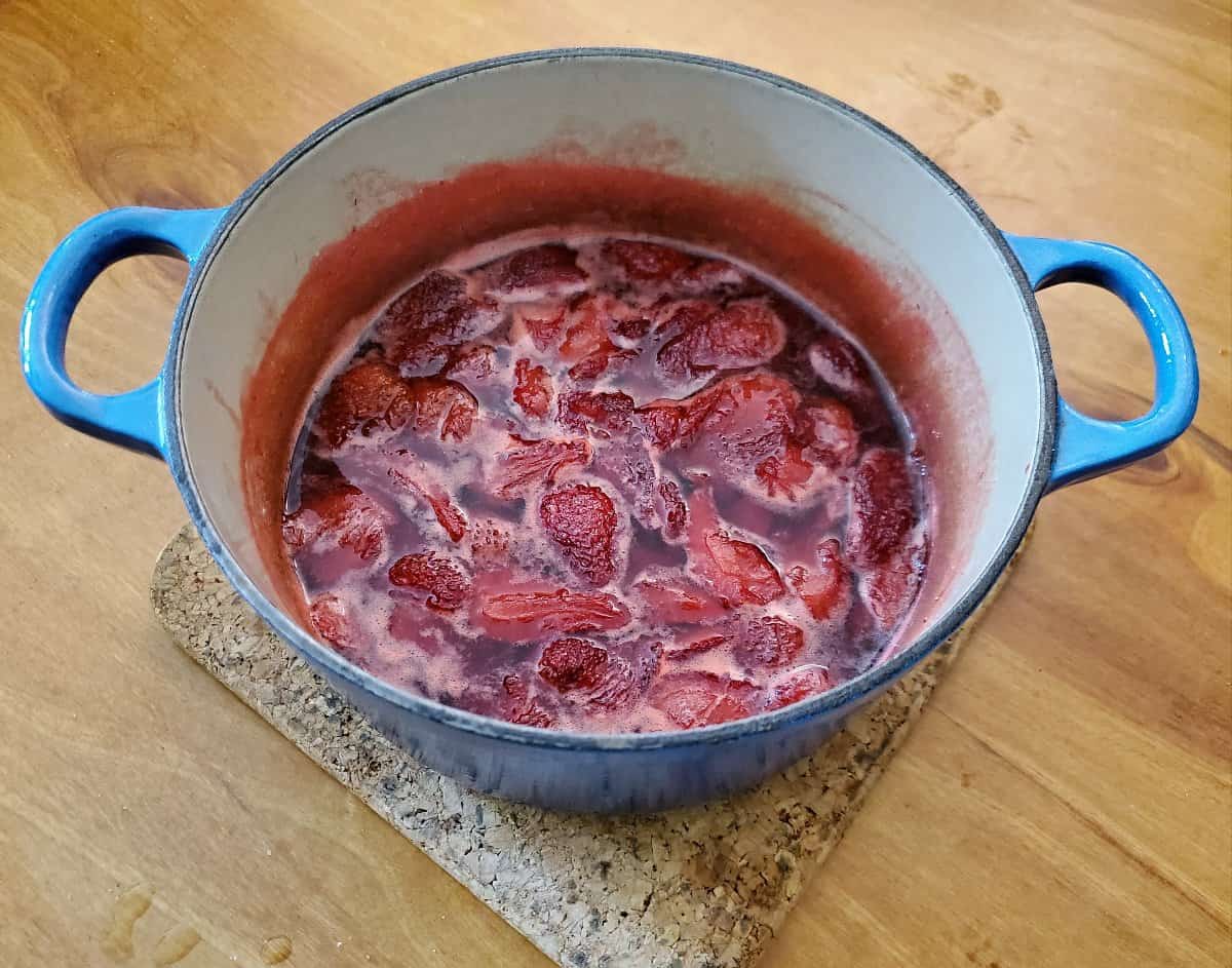 Finished strawberry syrup in a pot