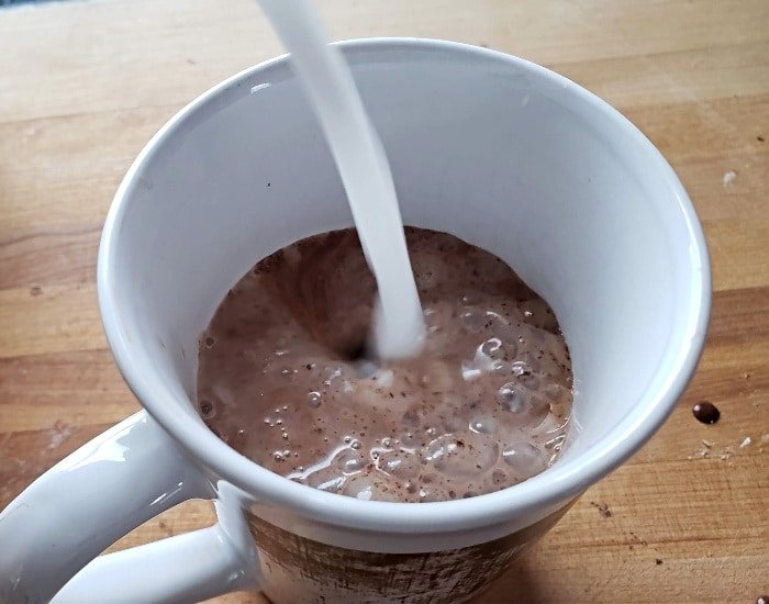 Add hot milk