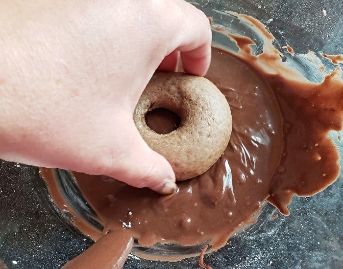 Dip and twist mocha donuts in glaze