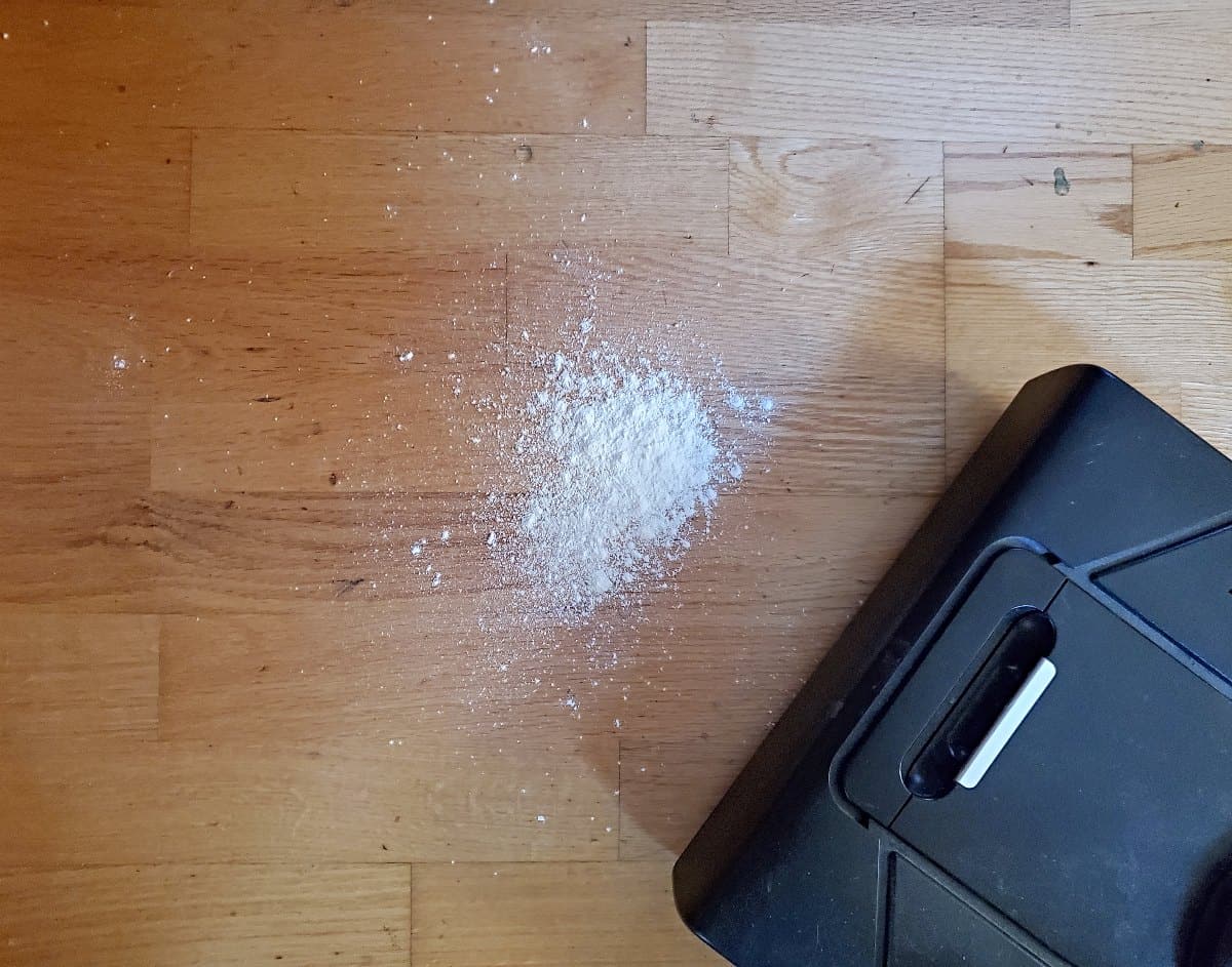 Neato Robotics vacuuming up flour as you figure out how to keep your house clean.