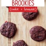 Overhead of chocolate cookies on a board with text Candy Cane Brookies Cookies plus brownies.