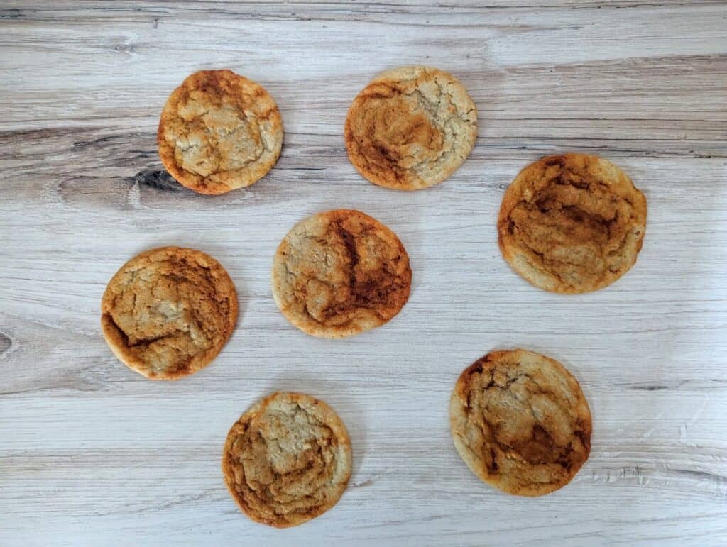 Overhead shot of gochujang cookies on a wooden board.