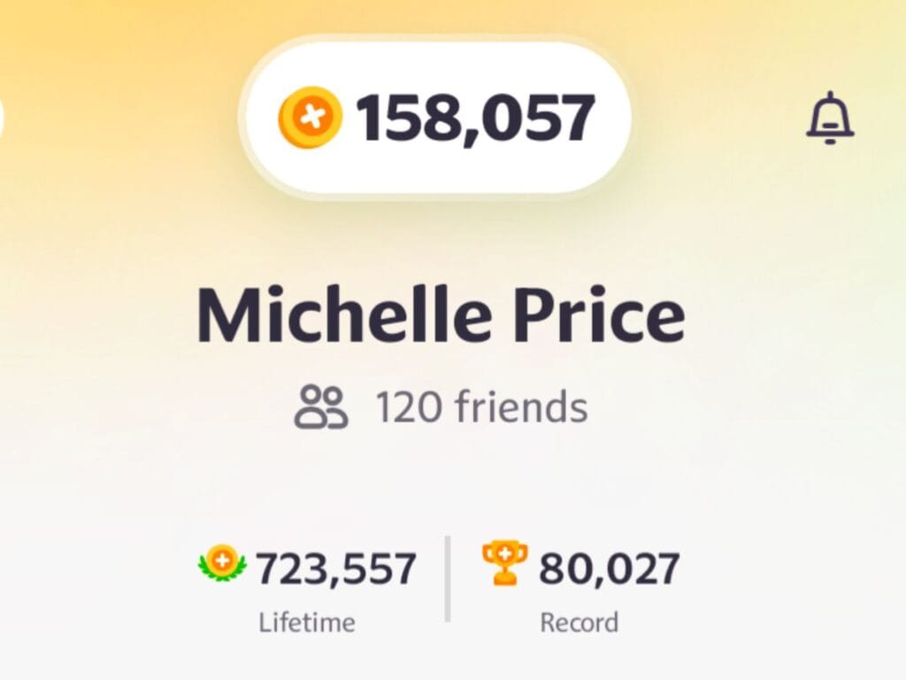 Profile summary showing 158,057 coins, 120 friends, a lifetime score of 723,557, and a record score of 80,027 for user Michelle Price.