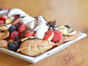 Image shows delicious dessert nachos on a platter.