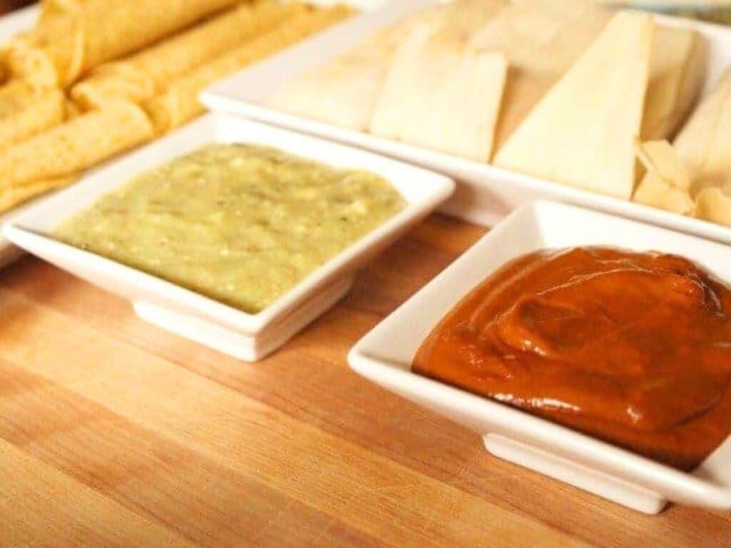 Image shows delicious homemade roasted tomatillo salsa.
