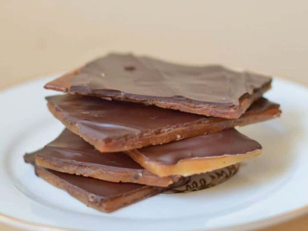 Image shows english toffee served on a plate.