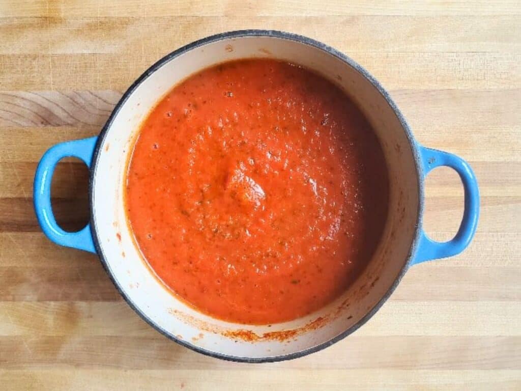 Image shows homemade marinara pasta sauce.