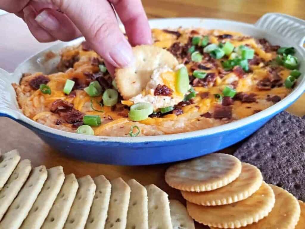 Image shows hot bacon cheddar dip recipe.