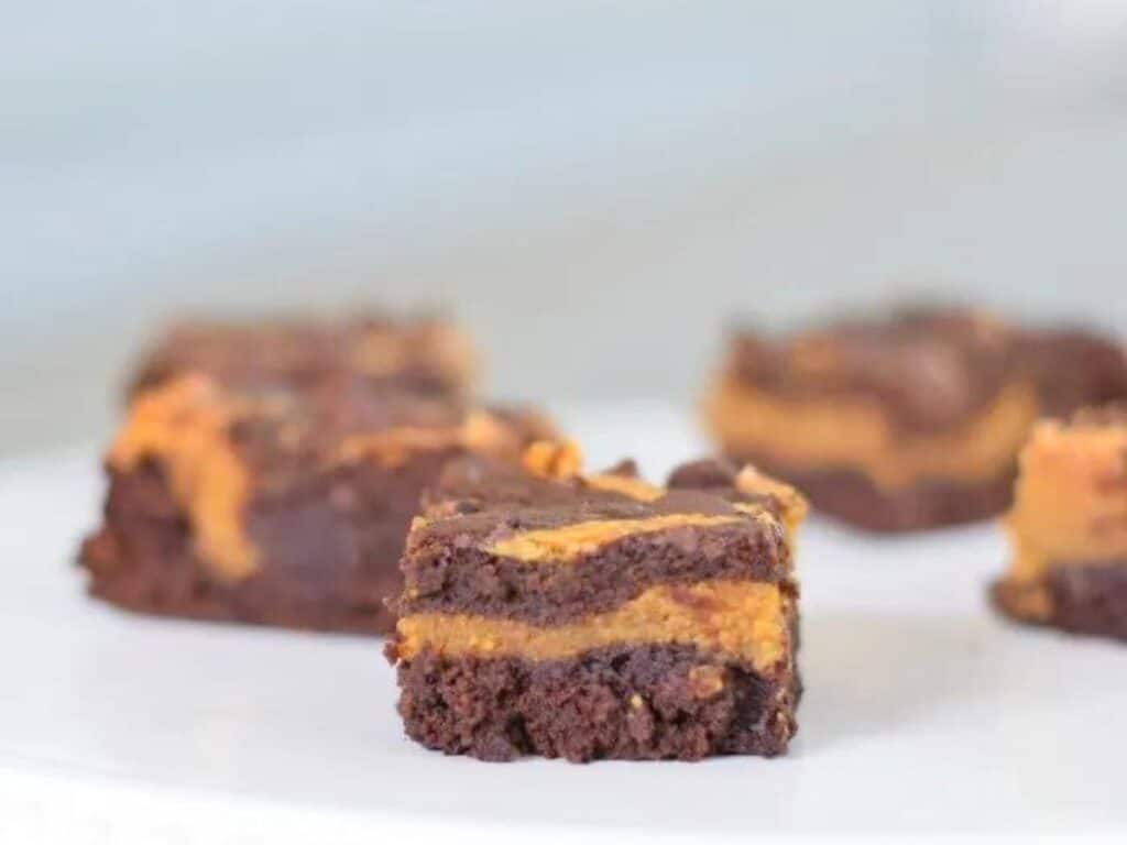 Image shows simple to make pumpkin swirl brownies.