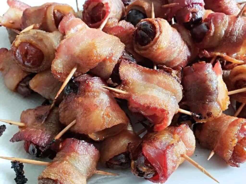 Image shows yummy bacon wrapped dates.