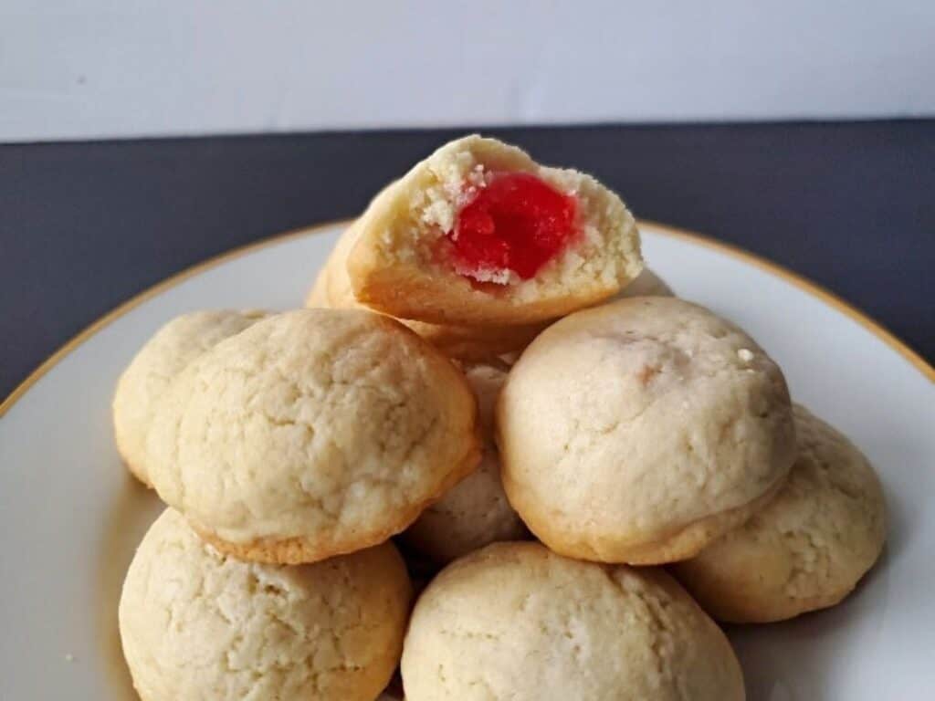 Image shows yummy cherry surprise cookies.