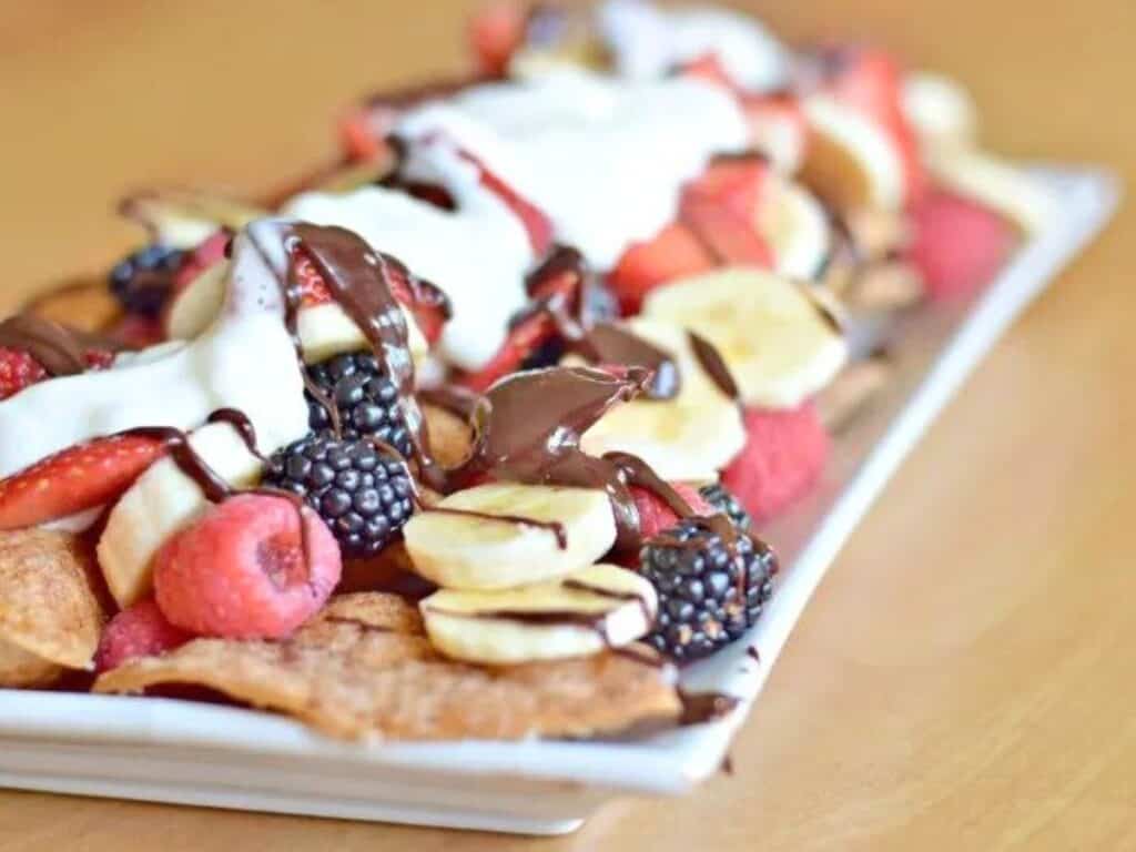 Image shows yummy dessert nachos on a platter.