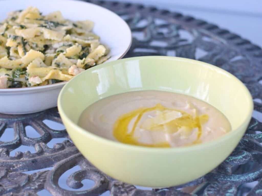Image shows yummy gluten free dairy free Tuscan bean soup.