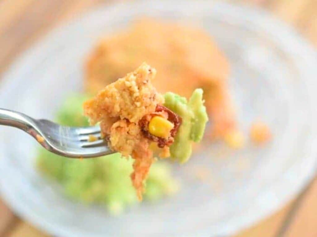 Image shows bite of easy to make tamale pot pie.