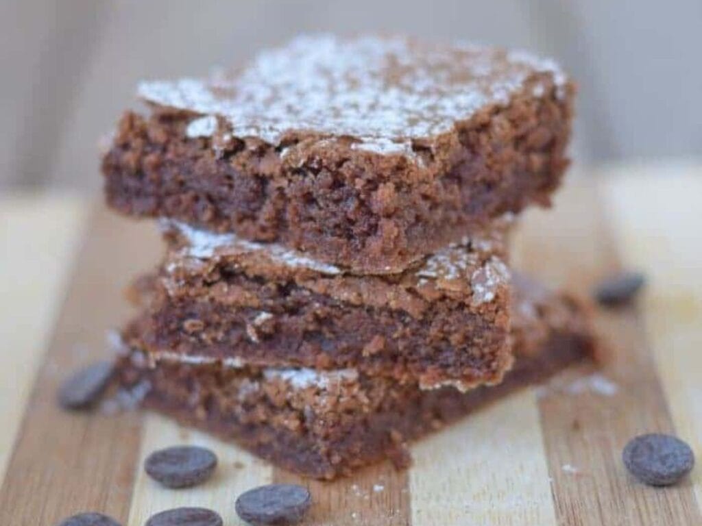 Image shows delicious classic brownies.