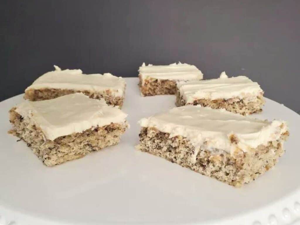 Image shows delicious plate of frosted banana bars.